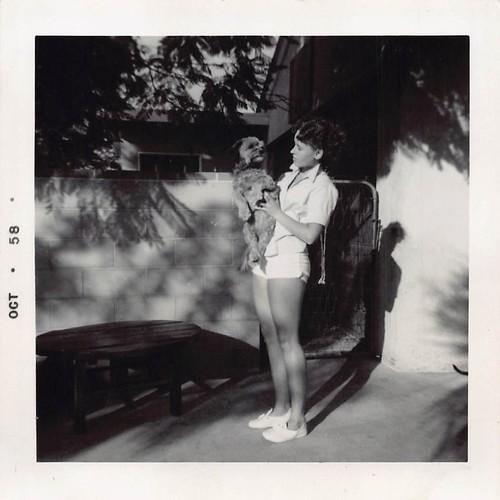 1958 young woman - 1958, holding